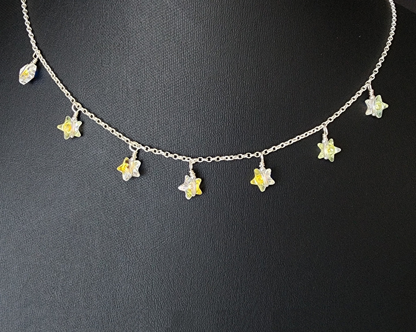 Brilliant Seven Stars Crystal Dangle Necklace with seven clear AB Austrian Crystal Stars on Sterling Silver chain.  
