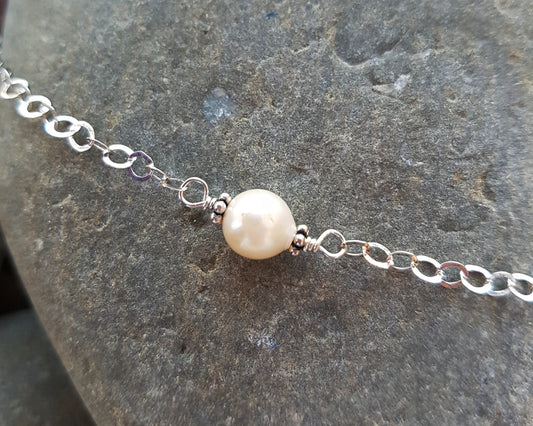 Floating Vintage white Cultured Pearl Necklace with sparkly Sterling Sivler chain. 