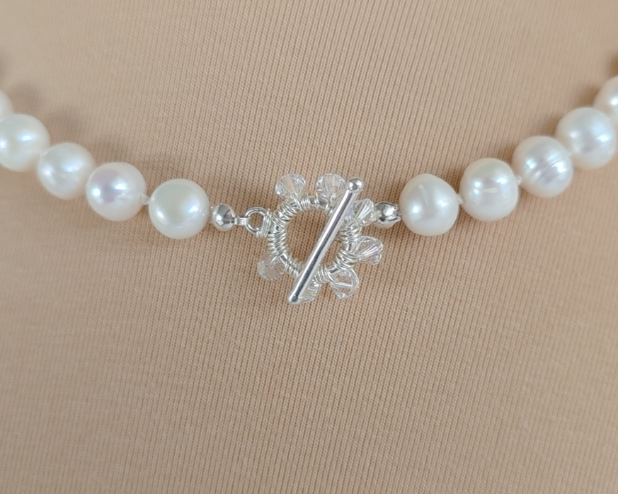 large white freshwater cultured pearl necklace, hand knotted with large crystal encrusted sterling silver toggle clasp