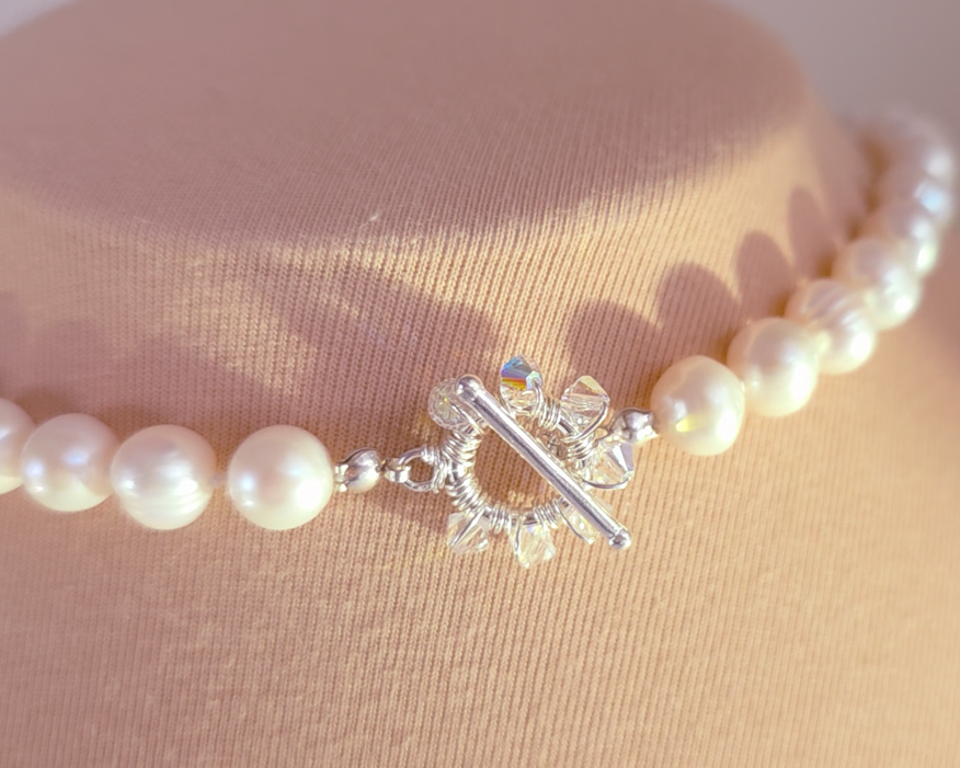 large white freshwater cultured pearl necklace, hand knotted with large crystal encrusted sterling silver toggle clasp