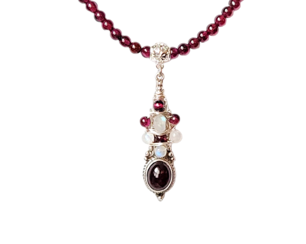 Celebration Garnet Moonstone Necklace with Moonstone Garnet Wire Wrapped Pendant in the center of a Deep Red Garnet Beaded Necklace