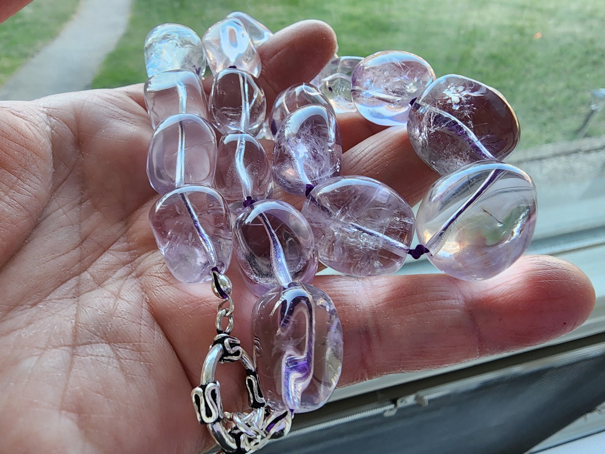 Translucent lavender Amethyst Nugget necklace, hand knotted with genuine Silk cord, finished with Sterling Silver and fancy antiqued Toggle Clasp on hand 