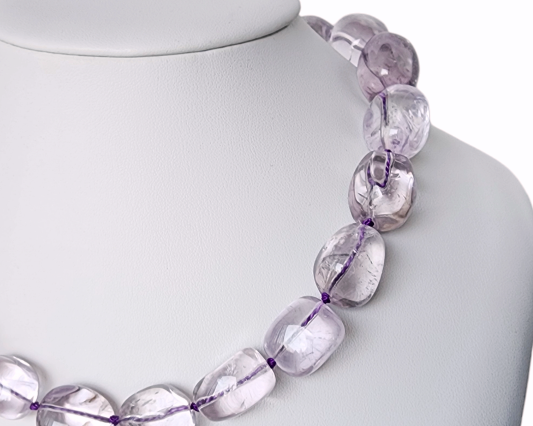 Translucent lavender Amethyst Nugget necklace, hand knotted with genuine Silk cord, on white display 