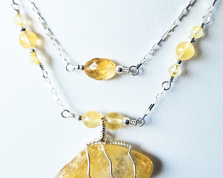 Double Strand Sterling Silver chain and yellow Citrine Gemstone necklace with large pendant on white display  