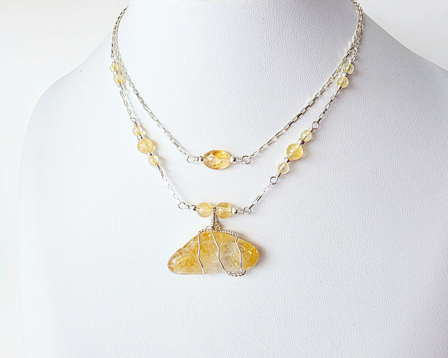 Double Strand Sterling Silver chain and yellow Citrine Gemstone necklace with large pendant on white display  