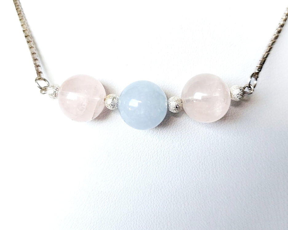 Three Gemstone Necklace with two Rose Quartz on either side of an Aquamarine in the centre box link Sterling Silver chain and extension chain. 