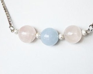 Three Gemstone Necklace with two Rose Quartz on either side of an Aquamarine in the Centre box link Sterling Silver chain and extension chain. 