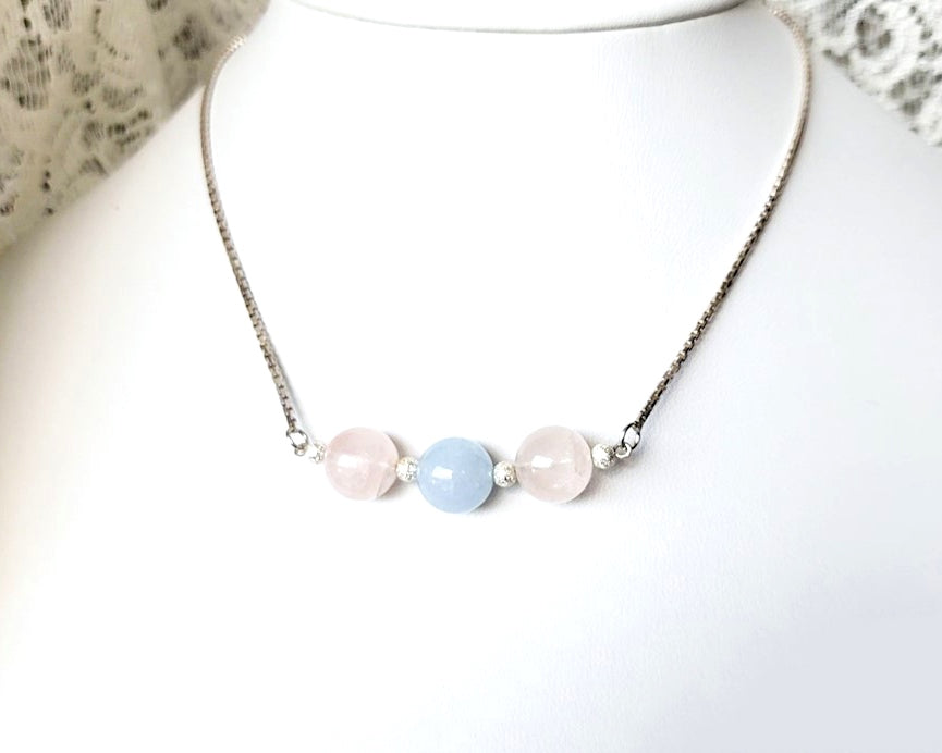 Three Gemstone Necklace with two Rose Quartz on either side of an Aquamarine in the centre box link Sterling Silver chain and extension chain. 