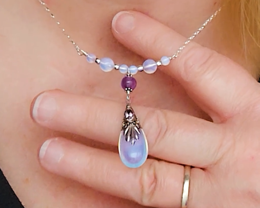Sterling Silver Art Deco Style Opalite Amethyst Necklace with large drop shape synthetic opal, faceted Amethyst dangling from round Amethyst and Opalite beads and Chain in hand