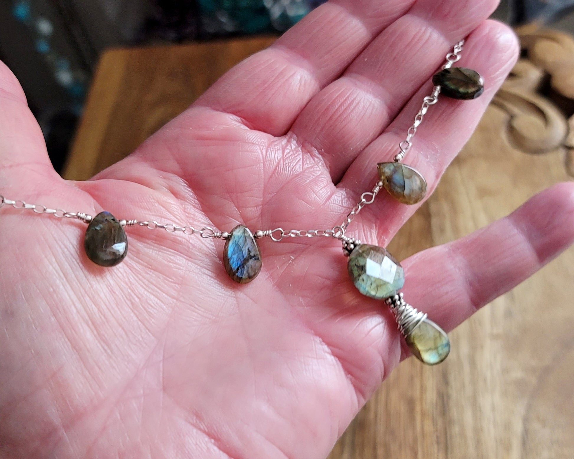 Light Dance Labradorite Necklace and Earring Set. Art Deco Style Sterling Silver Labradorite Necklace  in hand
