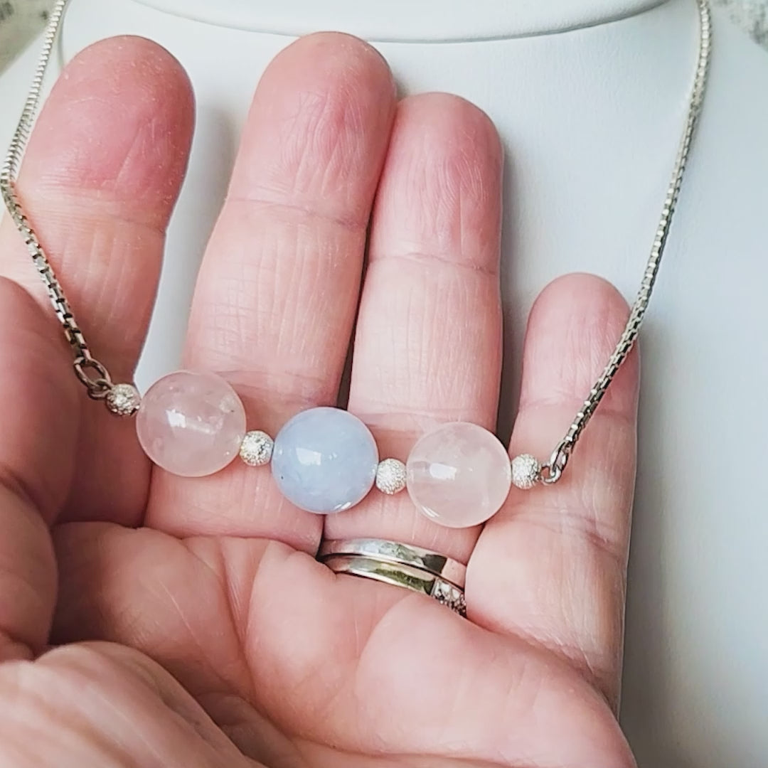 Three Gemstone Necklace with two Rose Quartz on either side of an Aquamarine in the centre box link Sterling Silver chain and extension chain. 