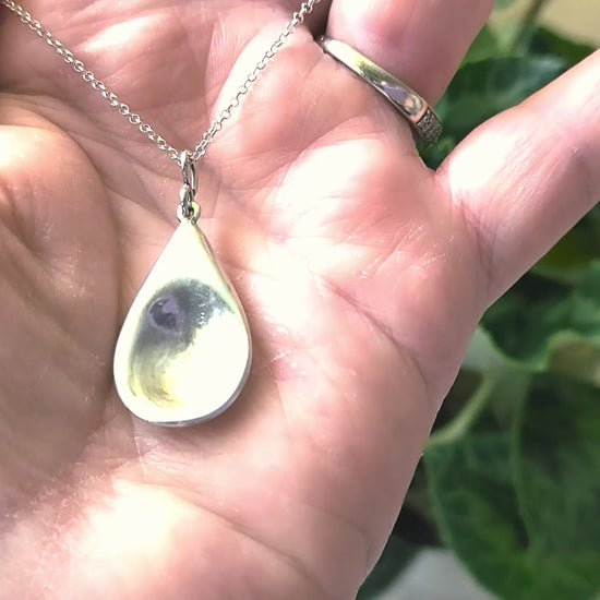 Video of Love inspired spoon shaped Sterling Silver pendant on rolo style chain 