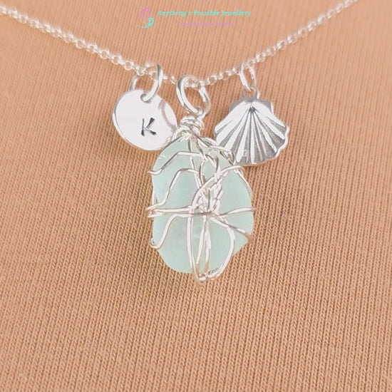 Video of Silver Sea Glass Necklace with Aqua blue Sea Glass wire wrapped with shell & initial pendants on chain