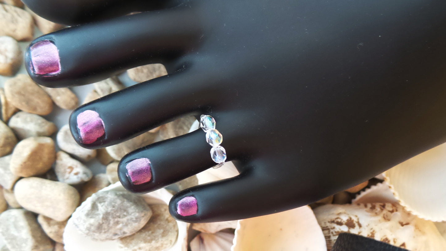 Toe Ring made with sparkly Czech Fire polished glass beads on strong clear elastic, fastened with Sterling Silver crimps.
