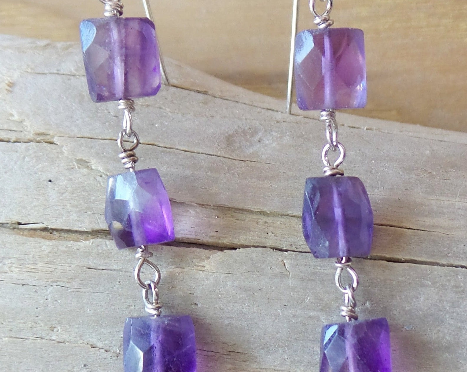 Long Amethyst Earrings with three square and rectangle faceted stones on Sterling Silver french earring hooks.