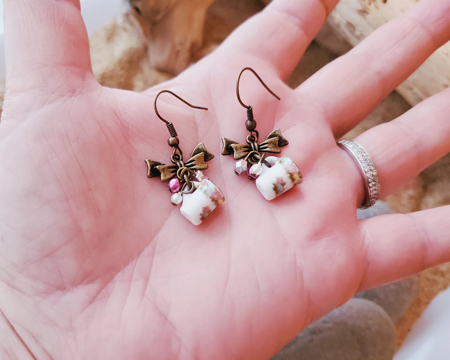 Shabby Chic, Vintage Coffee Cup Earrings displayed on Hand