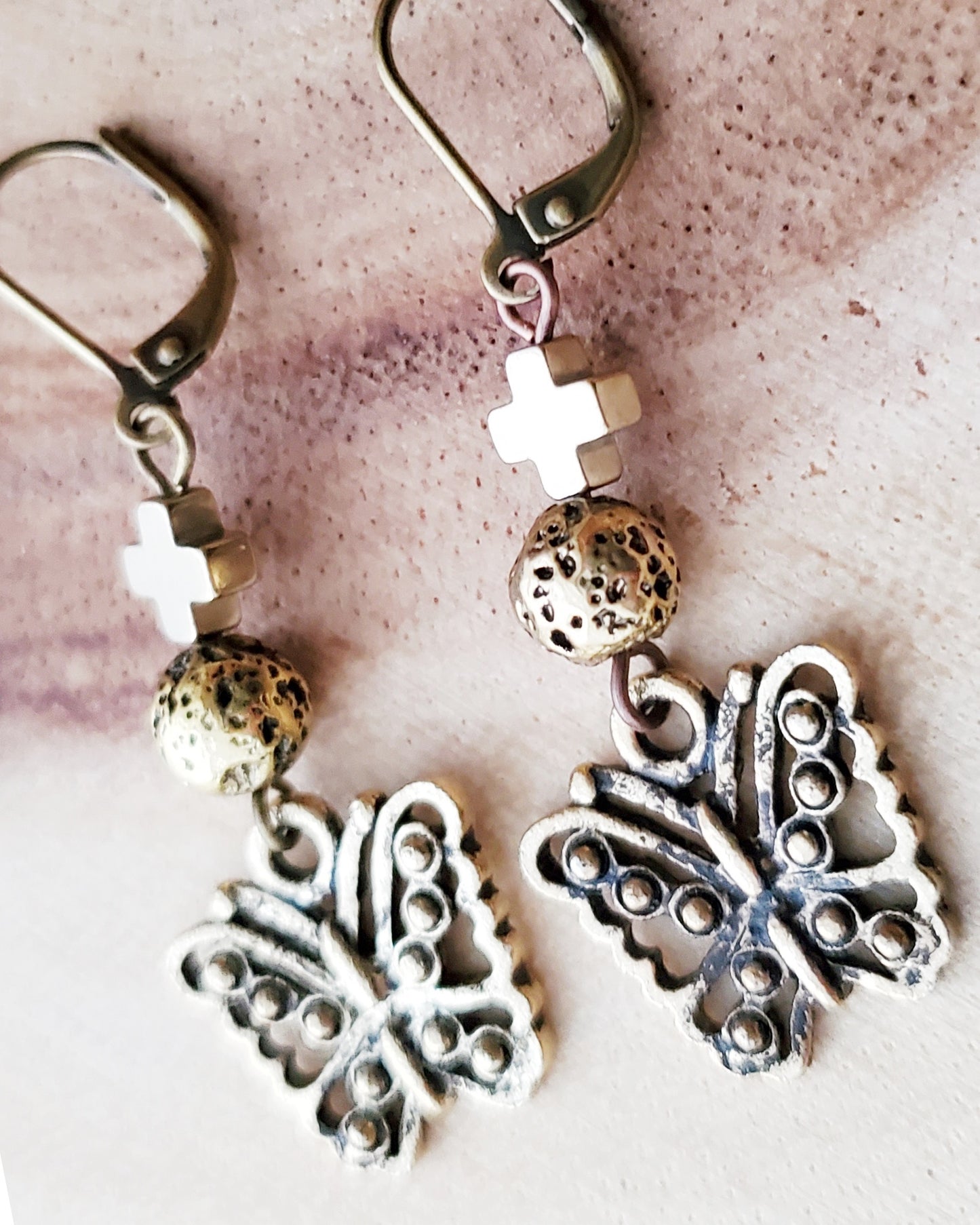 Transformation Butterfly Cross Lava Stone Earrings,  Gold Butterfly Earrings, Cross, Lava Stone, Hematite