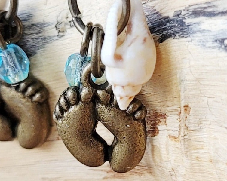 Foot Prints in the Sand Earrings, Footprints, Shells, Blue Fire Polished Glass, Antiqued Brass, earrings on beach wood