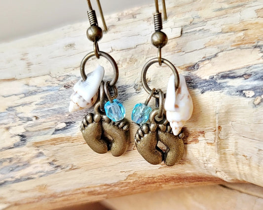 Foot Prints in the Sand Earrings, Footprints, Shells, Blue Fire Polished Glass, Antiqued Brass, earrings on beach wood