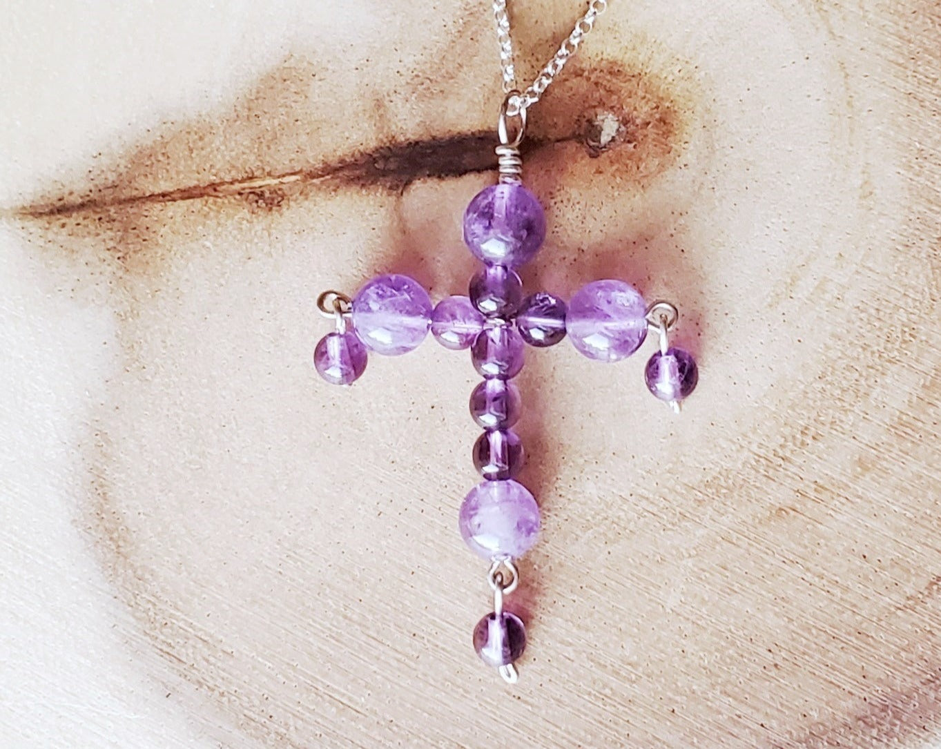 Love is Alive Amethyst Cross, A Handmade, Beaded Wire Work Cross made with purple Gemstone beads and Sterling Silver.