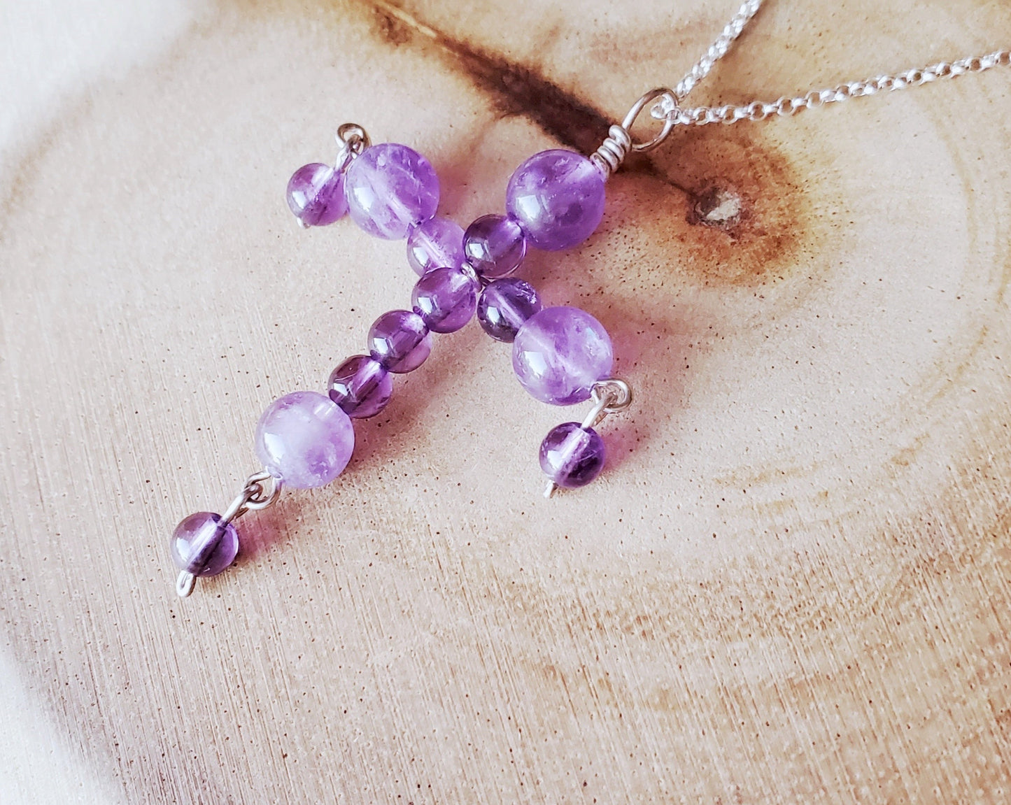 Love is Alive Amethyst Cross, A Handmade, Beaded Wire Work Cross made with purple Gemstone beads and Sterling Silver.