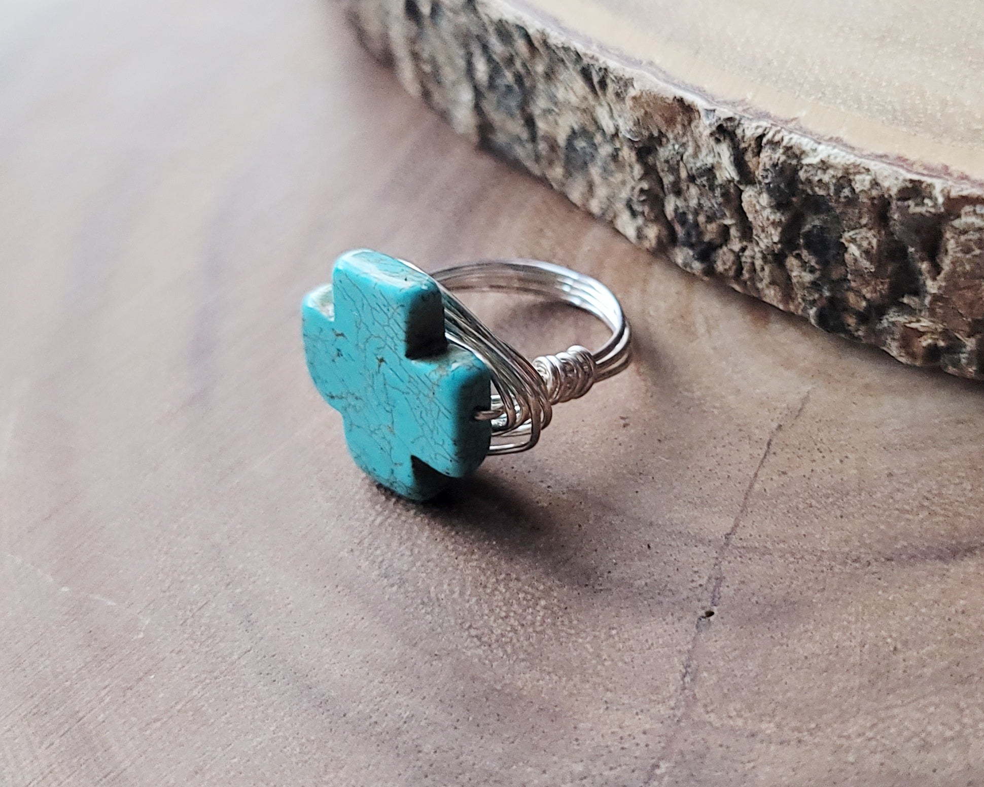 A Large Turquoise Cross Ring, wire wrapped ring made with high quality silver plated, copper base wire and a large symmetrical stone Cross.