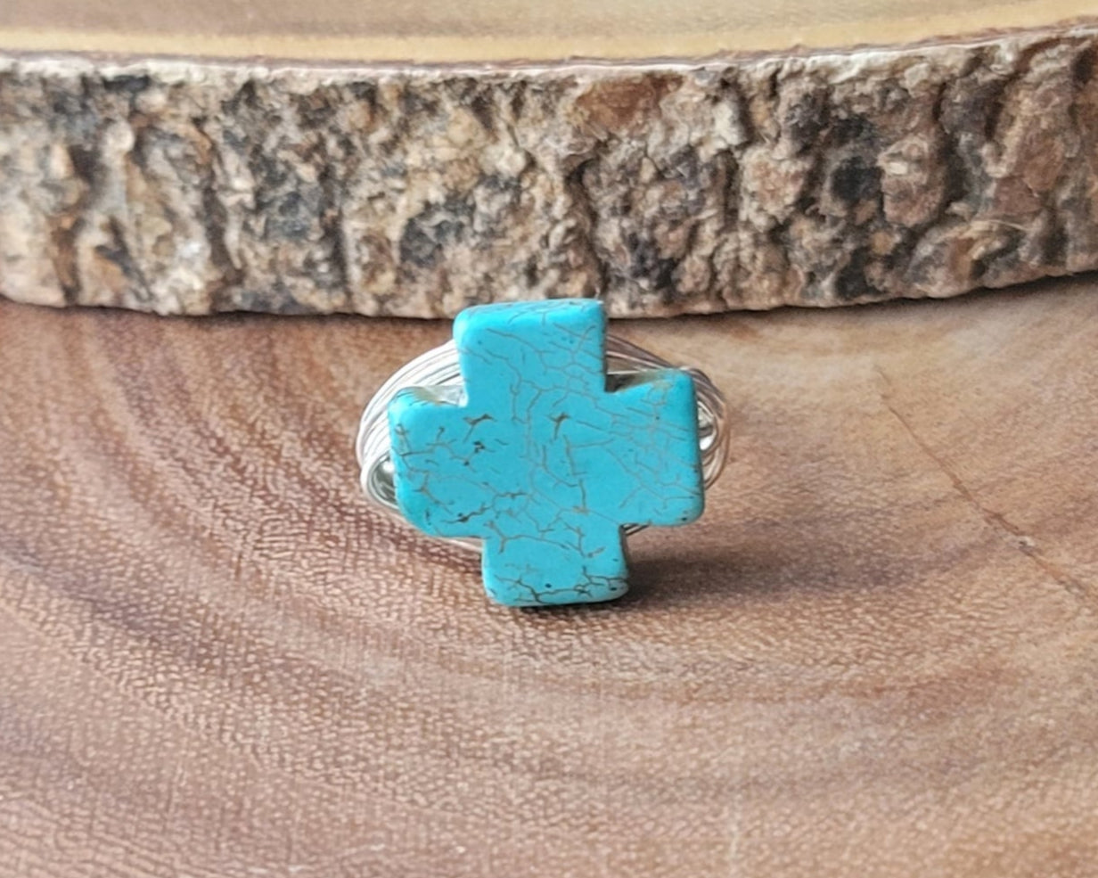 A Large Turquoise Cross Ring, wire wrapped ring made with high quality silver plated, copper base wire and a large symmetrical stone Cross.