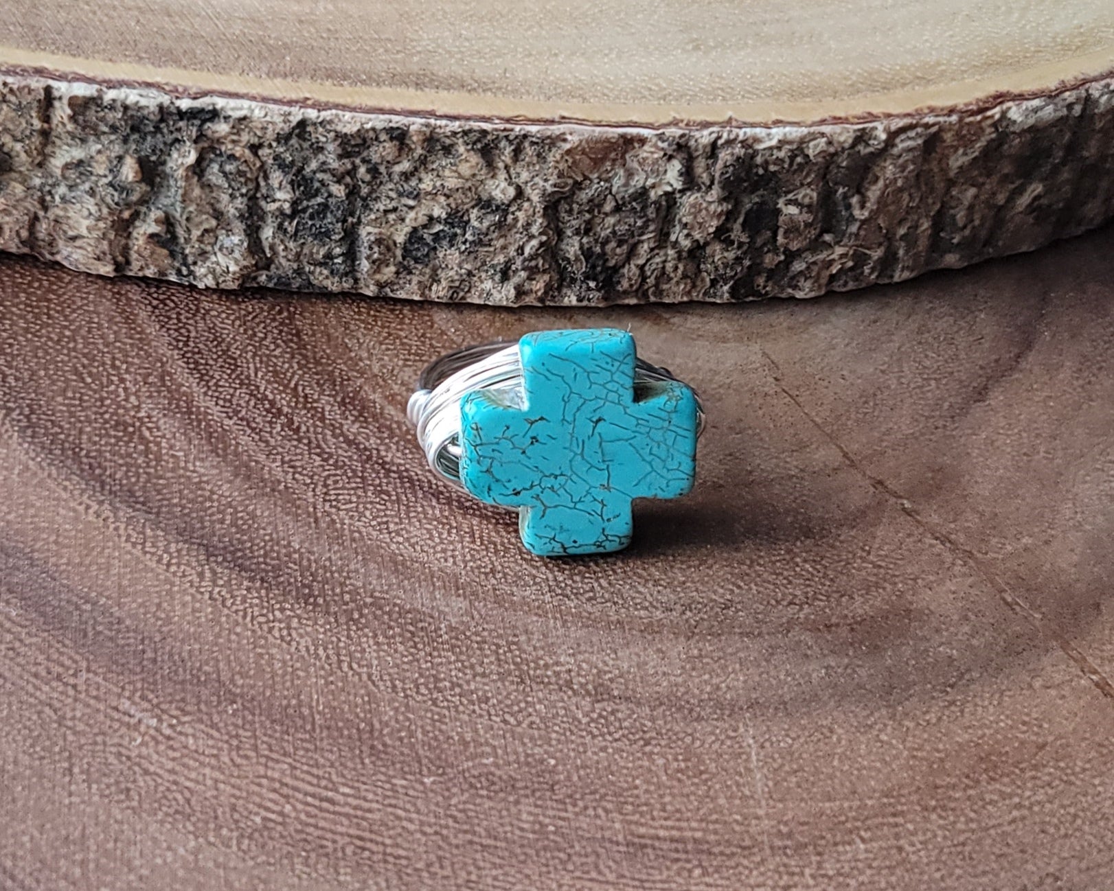 A Large Turquoise Cross Ring, wire wrapped ring made with high quality silver plated, copper base wire and a large symmetrical stone Cross.