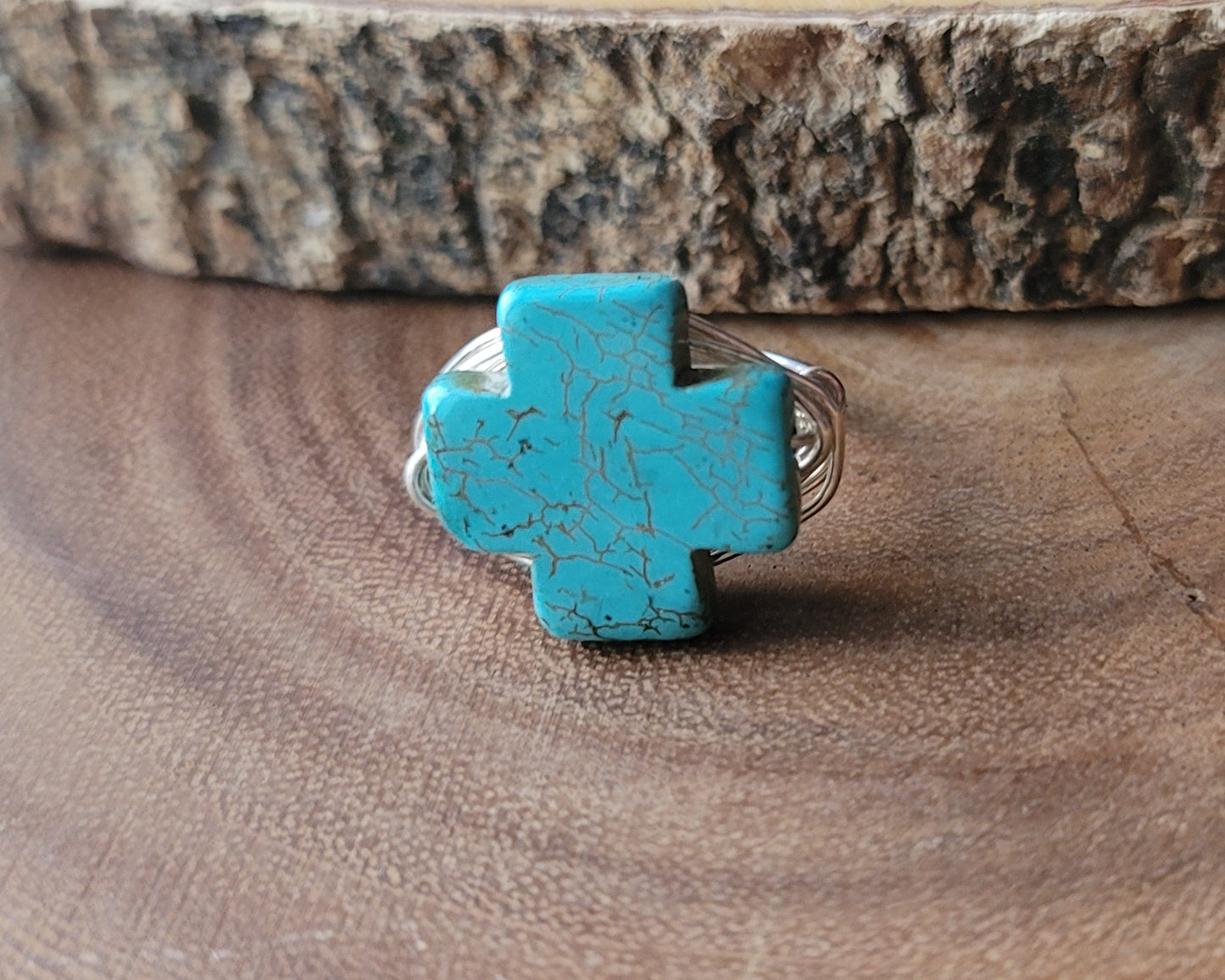 A Large Turquoise Cross Ring, wire wrapped ring made with high quality silver plated, copper base wire and a large symmetrical stone Cross.