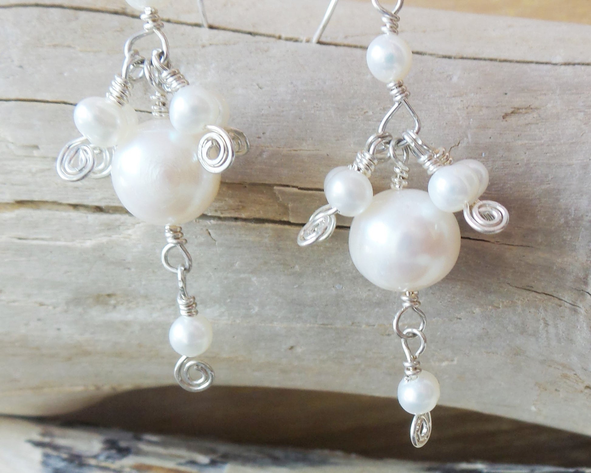 Eternal Celtic Jig Pearl Earrings, Unique Long Sterling Silver White Freshwater Cultured Pearl Earrings with Celtic Eternit coils on the ends of the small pearlss
