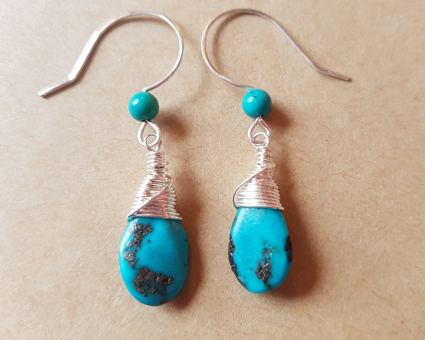 Long Elegant Turquoise Dangle Earrings, Sterling Silver and rich, deep turquoise stones, drop shaped briolette’s, smaller round turquoise on the french style earrings hooks