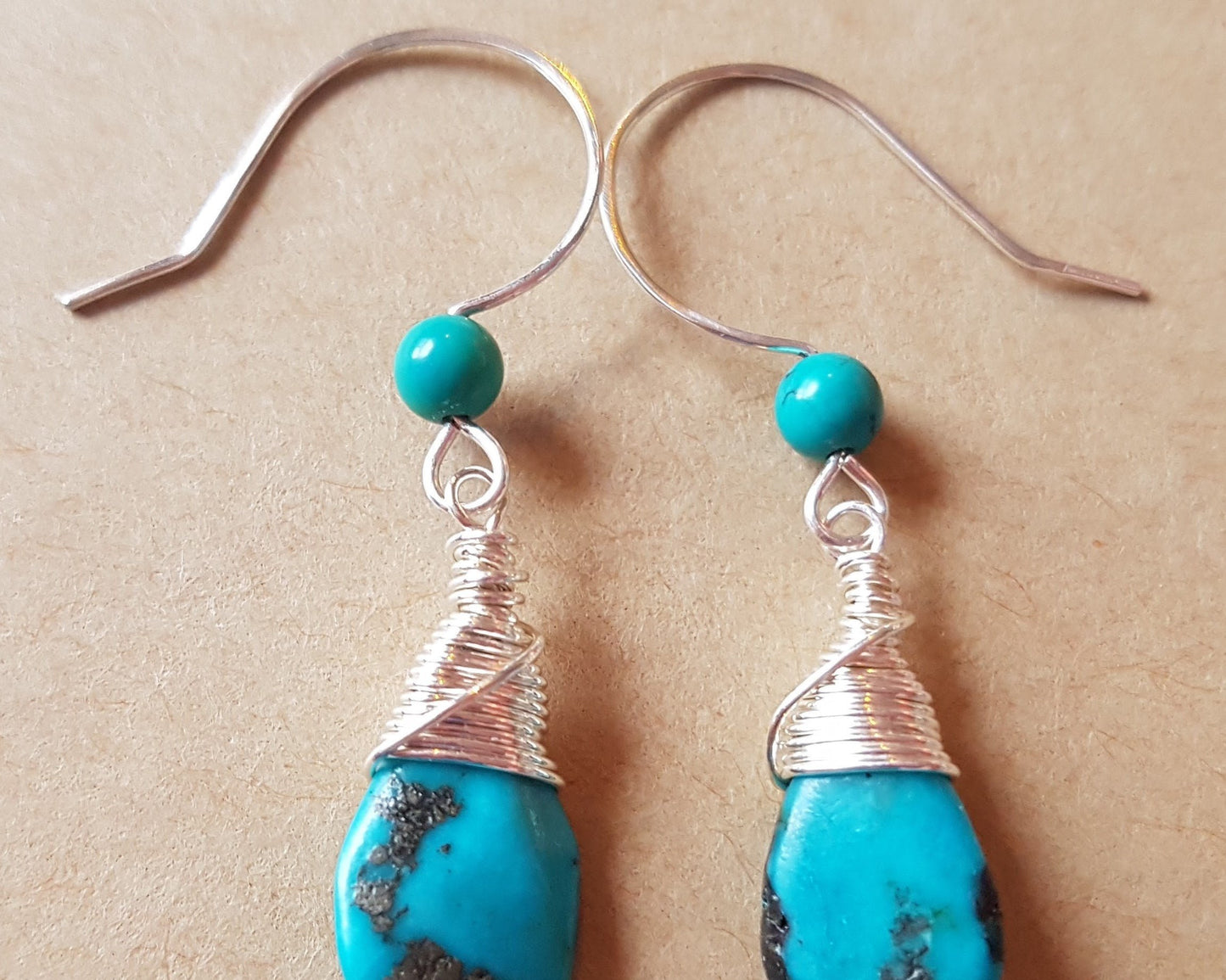 Long Elegant Turquoise Dangle Earrings, Sterling Silver and rich, deep turquoise stones, drop shaped briolette’s, smaller round turquoise on the french style earrings hooks