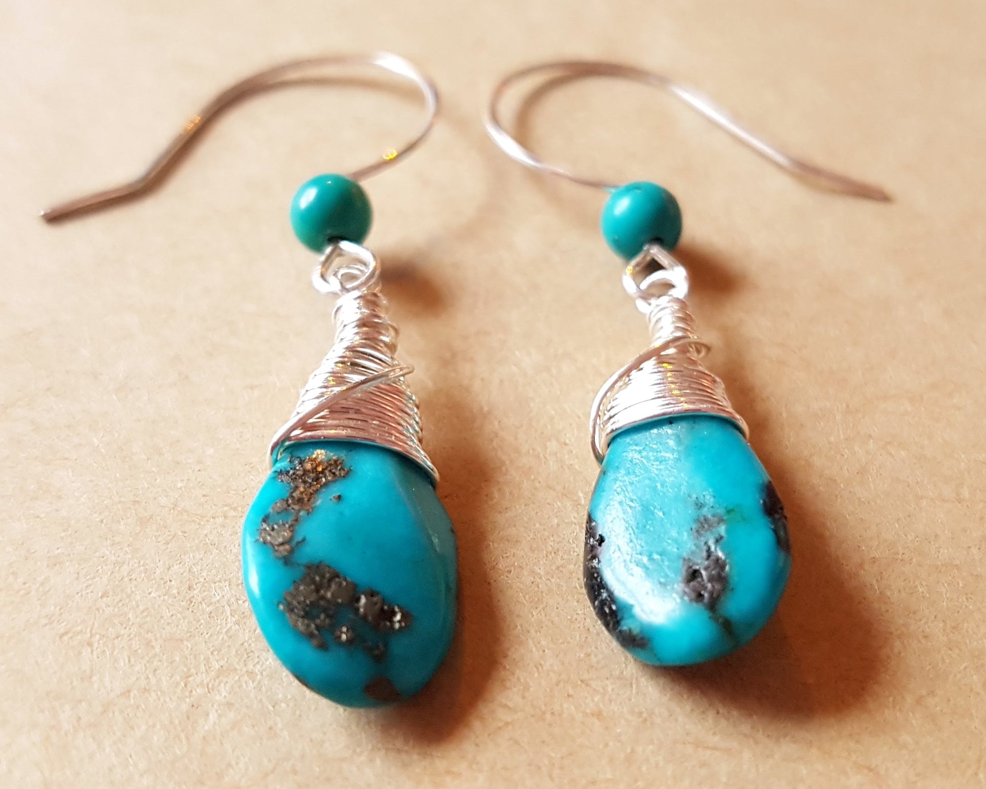 Long Elegant Turquoise Dangle Earrings, Sterling Silver and rich, deep turquoise stones, drop shaped briolette’s, smaller round turquoise on the french style earrings hooks