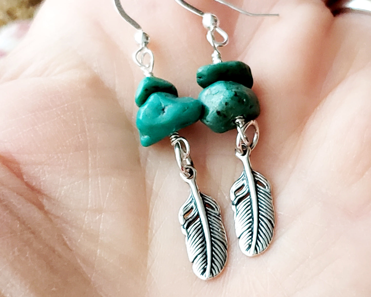 Turquoise Feather dangle earrings with rare, deep greenish vintage turquoise nuggets & sterling silver feather pendants with shell background