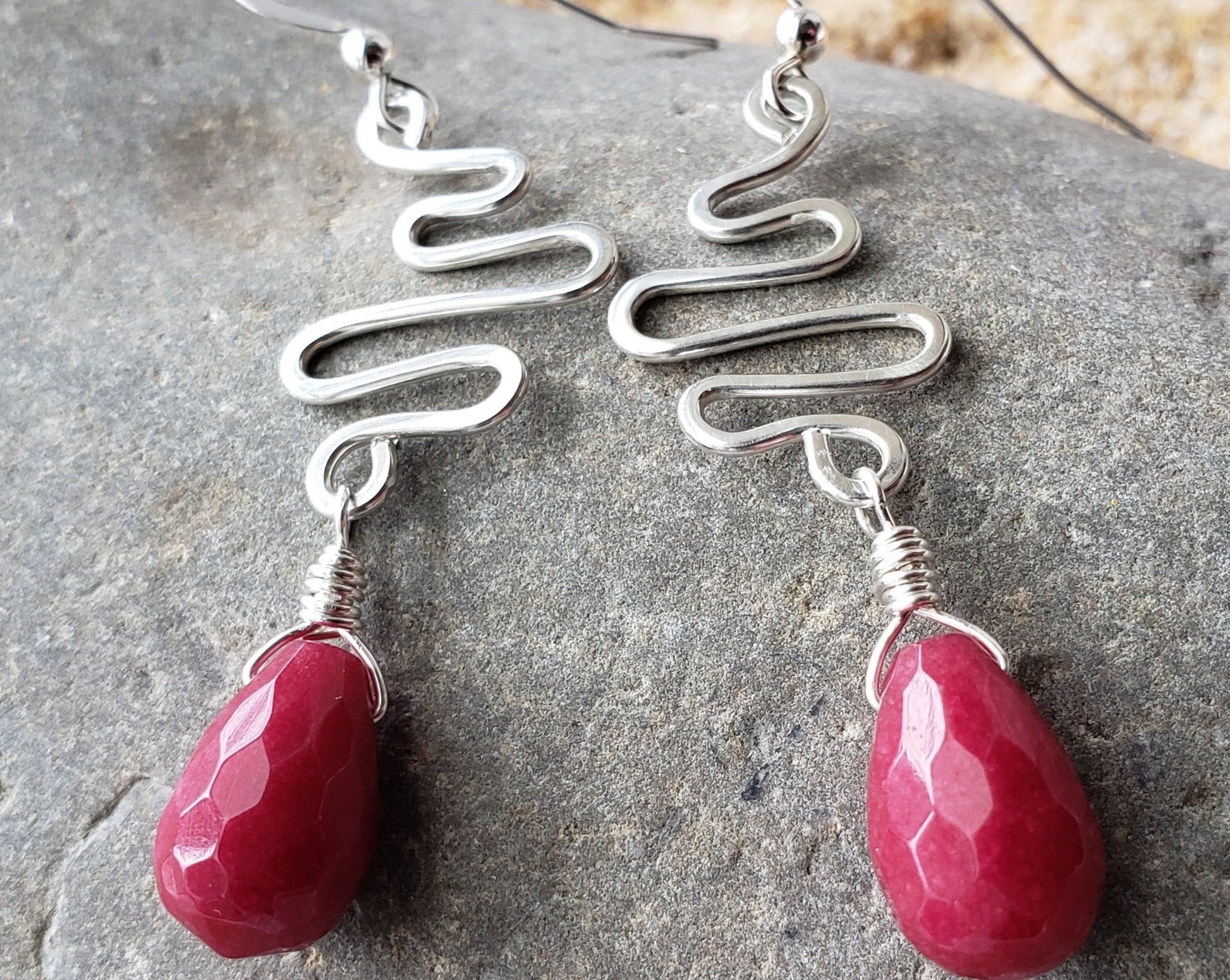 Celtic River Red Jade Sterling Silver Dangle Earrings, Long Swirling design earrings with dangling red stone.