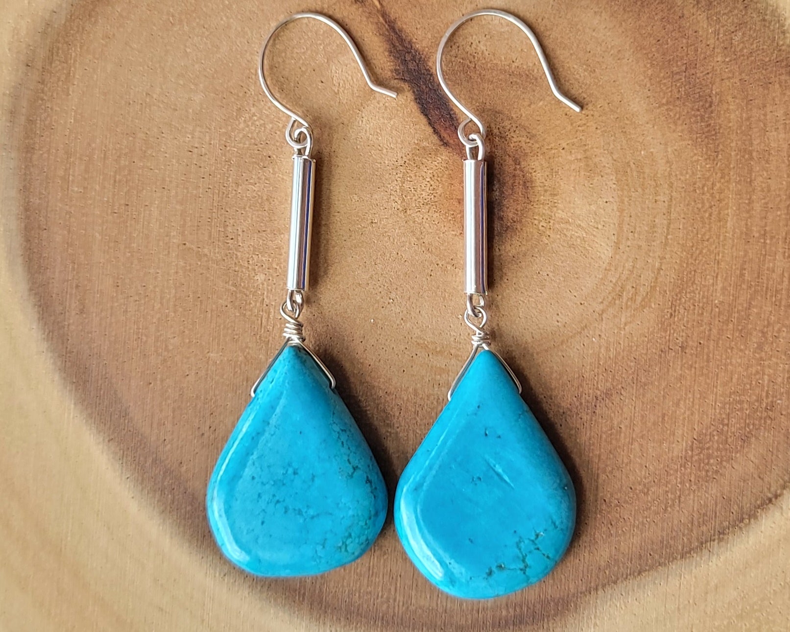 Long Turquoise Howlite Art Deco Style Drop Earrings, large drop shaped stones on thin Sterling Silver tubes, dangling from french hooks. 