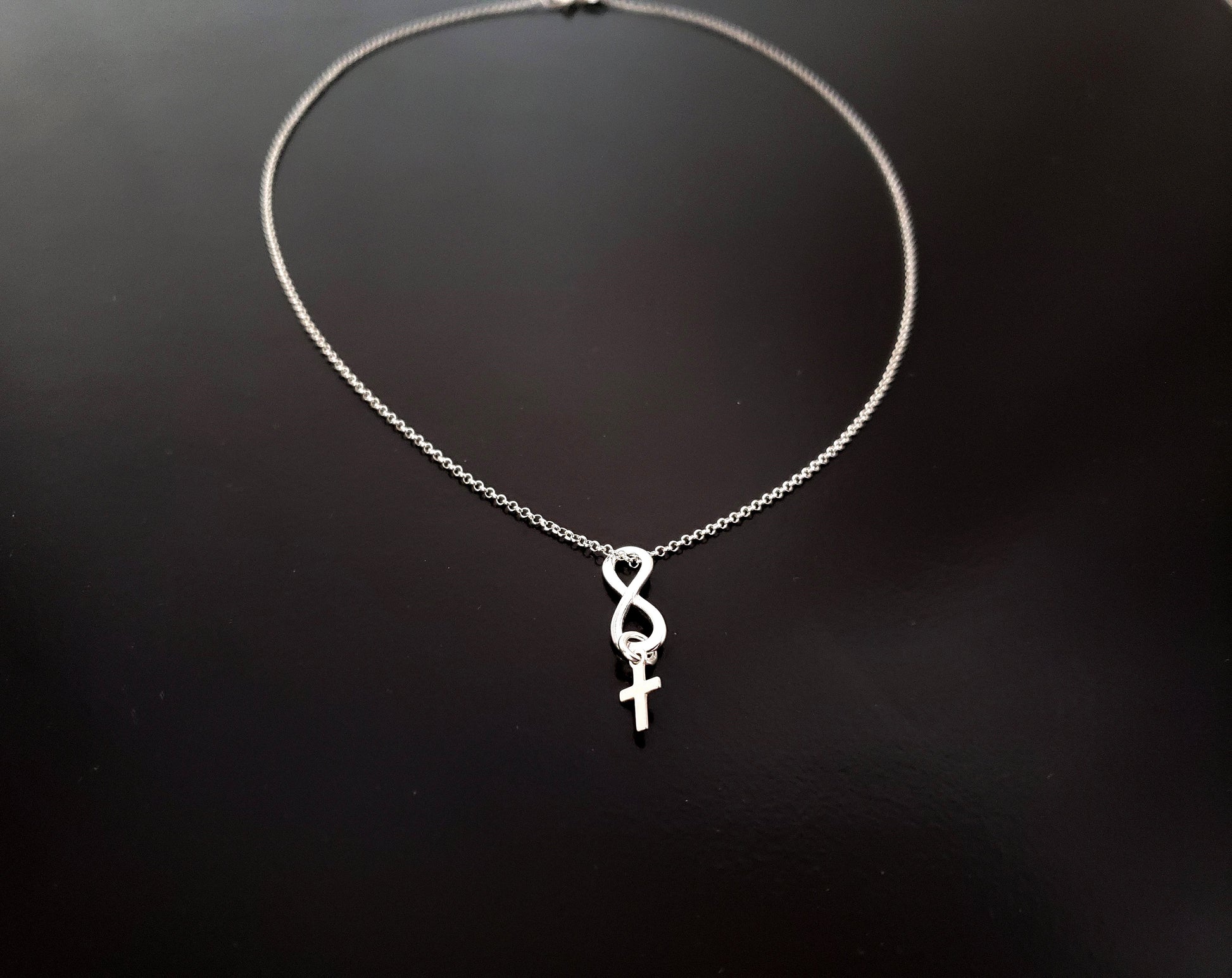 Infinity Cross Sterling Silver Necklace, Sterling Silver Infinity Pendant with tiny Cross dangling below on Sterling Sivler Rolo chain. 