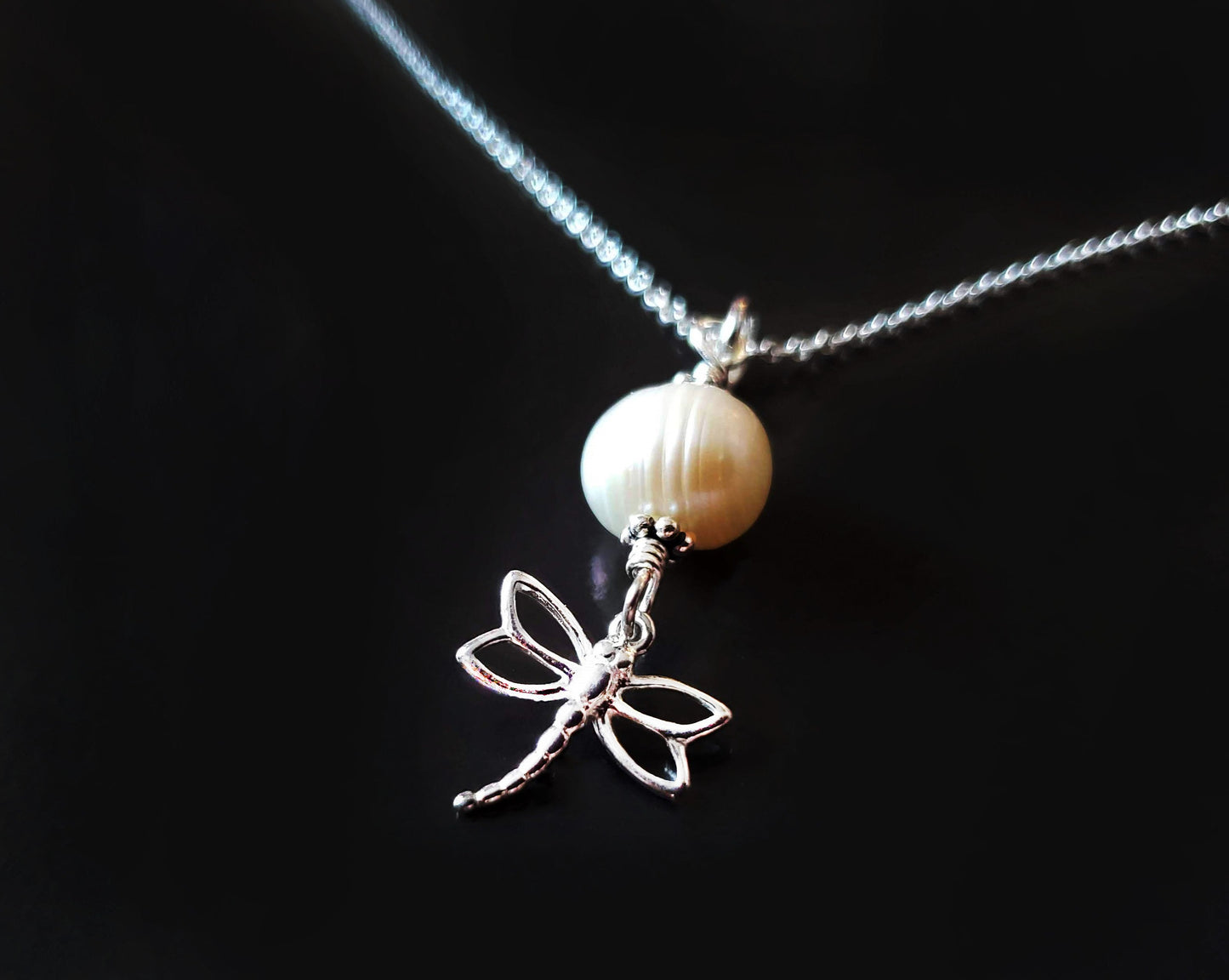 Minimalist Dragonfly Pearl pendant necklace made with all 925 Sterling silver and a large Genuine Freshwater Pearl. 