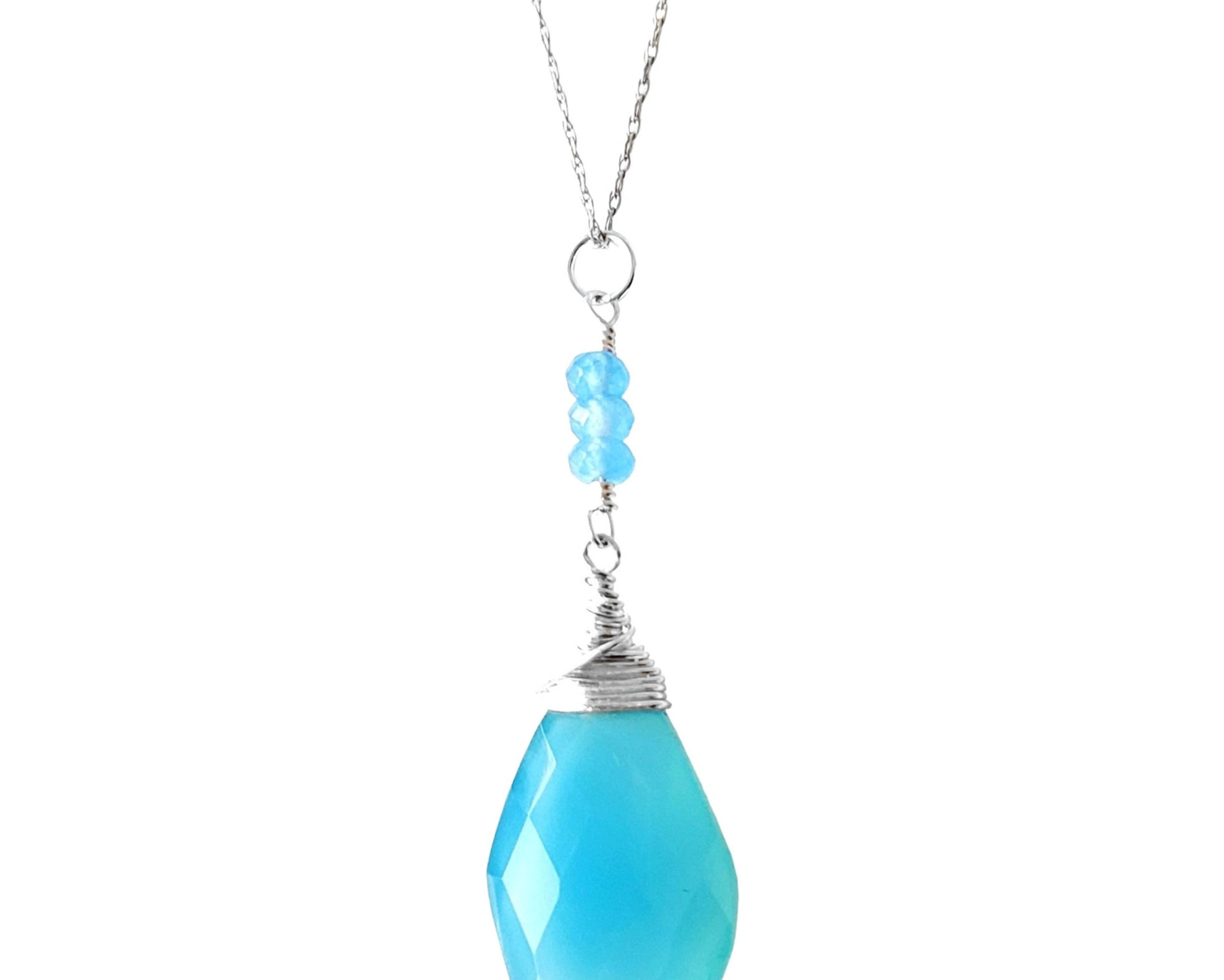 Art Deco Inspired Blue Chalcedony Jade Pendant made with Sterling Silver,  large blue Chalcedony stone decoratively wire wrapped to small blue Jade stones, dangle on a fine chain. 